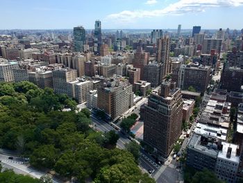 High angle view of street amidst buildings in city