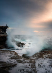 Scenic view of sea against sky during sunset