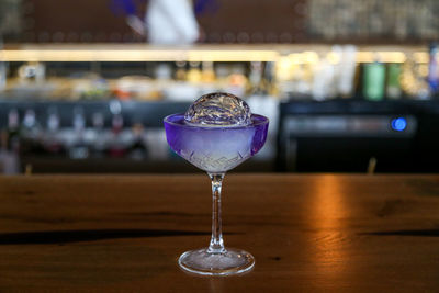 Close-up of wine glass on table in restaurant