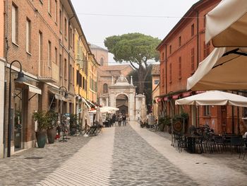 People walking on street in city