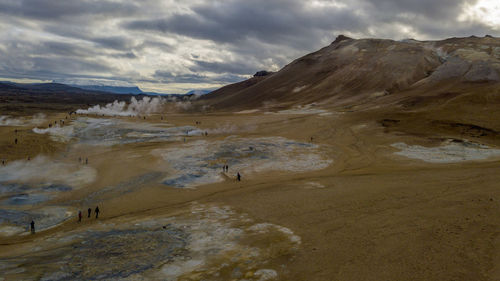 Scenic view of mountains against sky at hverir, namafjall geothermal area, iceland