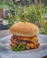 Close-up of burger in plate on table