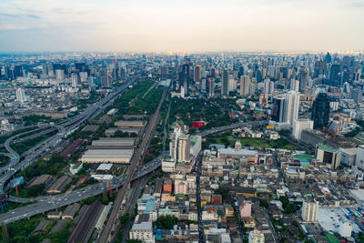 Aerial view of cityscape against sky