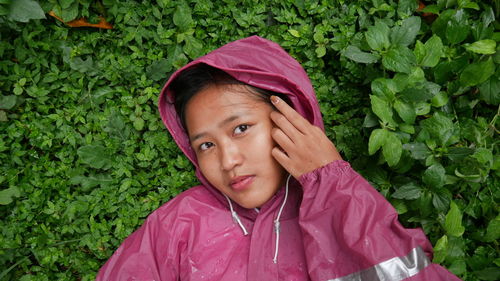 Portrait of cute girl in rain