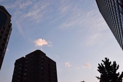 Low angle view of skyscrapers against sky