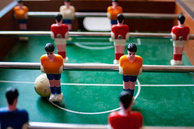 Close-up of small figurine on table