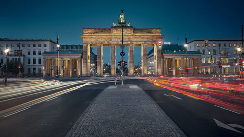 Light trails on city street at night