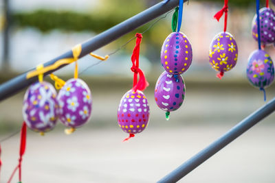 Close-up of multi colored hanging on clothesline