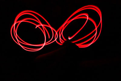 Close-up view of red light against black background