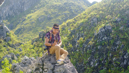 Man standing on rock