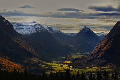 Scenic view of mountains against sky during sunset