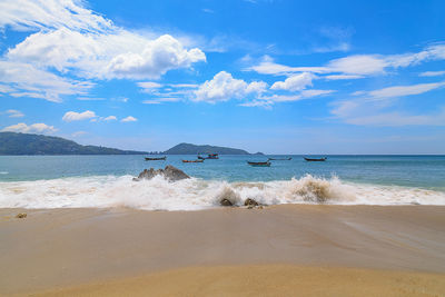 Scenic view of beach against sky