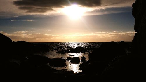 Scenic view of sea at sunset