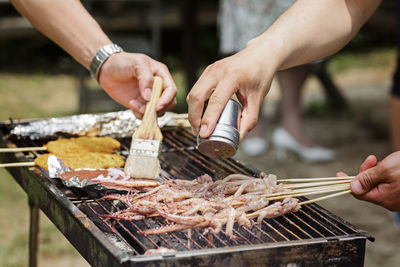 Cropped image of man preparing food