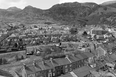 High angle view of townscape against mountains