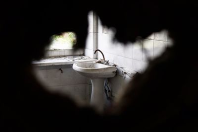 Close-up of faucet in bathroom