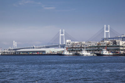 Tokyo bay against yokohama bay bridge in city