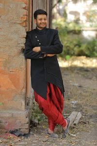 Portrait of woman standing outdoors