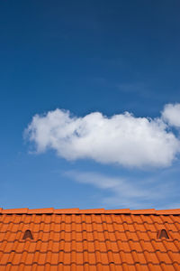 Low angle view of stone roof against sky