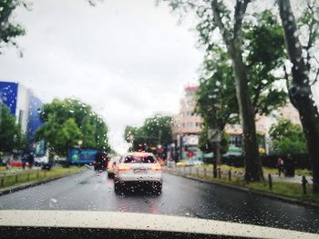 Cars on road in city