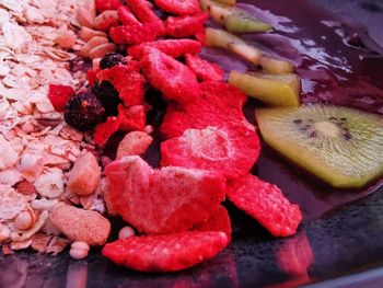 Close-up of chopped fruits in container