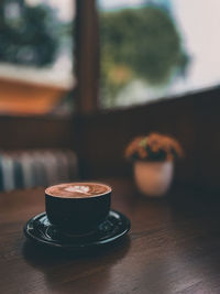 Close-up of coffee on table with blurry background