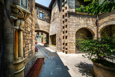 Alley amidst buildings in city