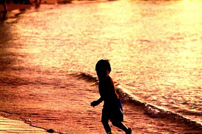 Woman standing in water