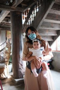 Portrait of grandmother with her granddaughter 