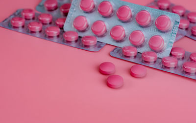 Close-up of pills on yellow background