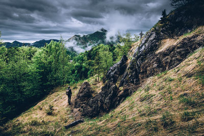 Man explore the old mines in mountain concept of leisure activity and hiking in the mountains