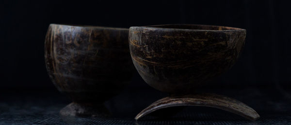 Close-up of wooden bowls on table