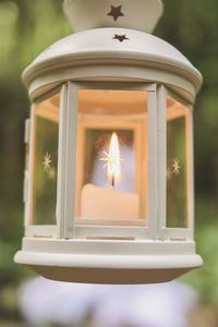 Close-up of illuminated lamp against blurred background