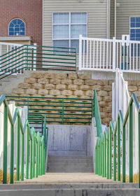 Staircase by building in city