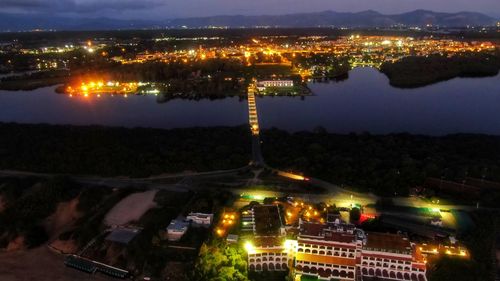 High angle view of illuminated buildings at night