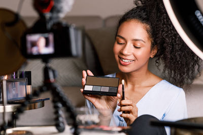 Young woman using mobile phone