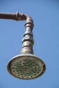 Close-up low angle view of blue sky