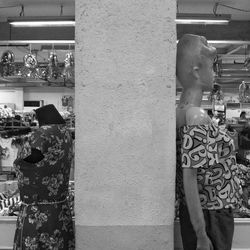 Midsection of woman standing in store