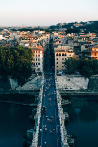 High angle view of river amidst buildings in city