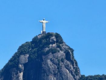 Low angle view of lighthouse against clear blue sky, rio de janeiro,  brazil, christ the redeemer 
