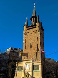 Low angle view of building against blue sky