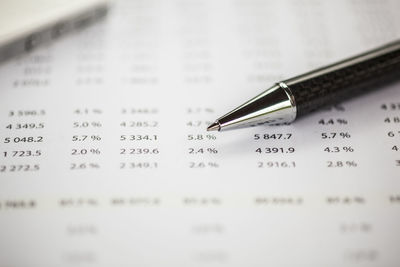 Close-up of pen on paper