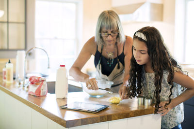 Female friends working at home