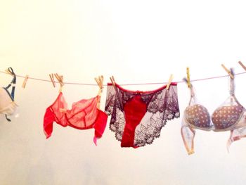 Close-up of clothes hanging on clothesline