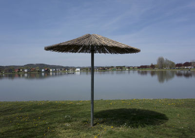 A sunshade or parasol in summer as a sun protection