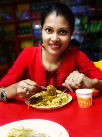 Portrait of a smiling young woman