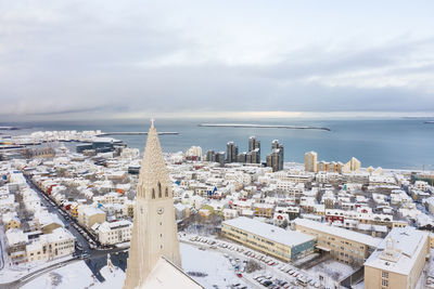 Amazing high church in town in winter on seashore