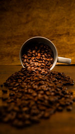 High angle view of roasted coffee beans on table