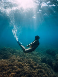 Man swimming in sea