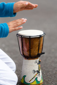 Close-up of hand holding drink